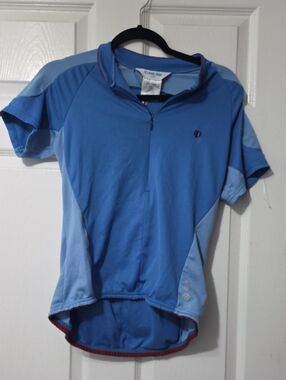 Pearl Izumi Light Blue Cycling Jersey with Red Logo